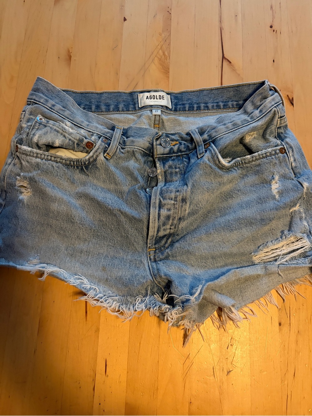 Agolde Light Blue Distressed Denim Cutoff Shorts